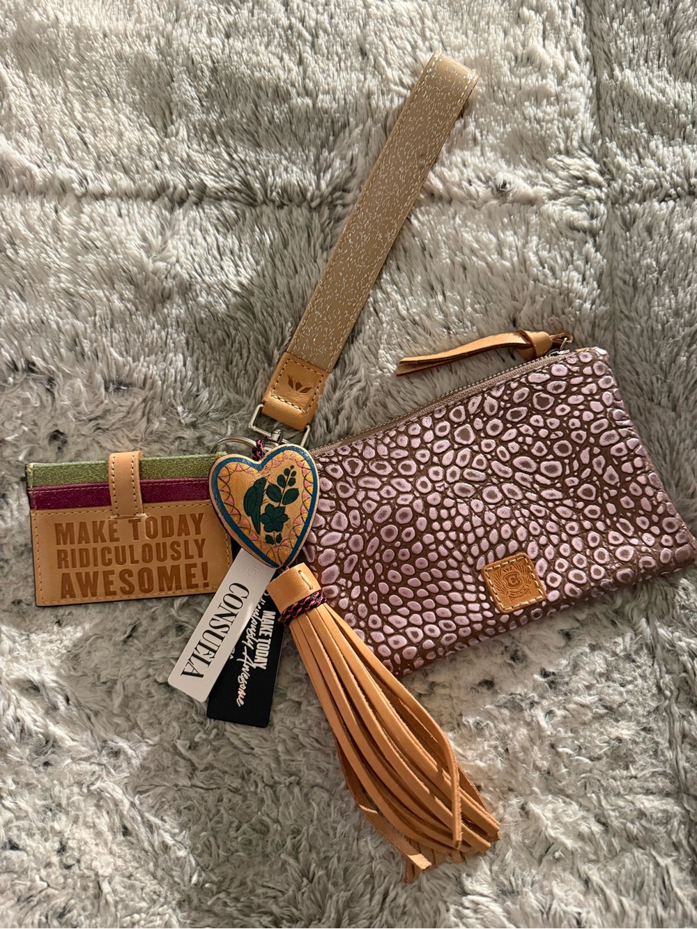 Consuela Pink Pebble-Print Wristlet with Tan Tassel & Heart Charm